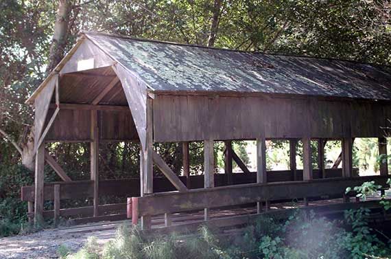 a rustic covered bridge