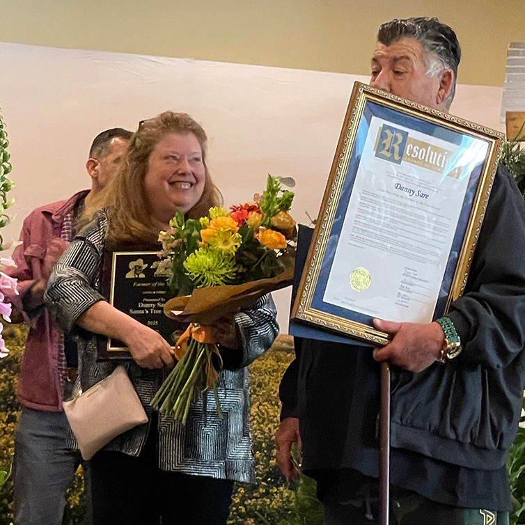 dan sare receiving the 2025 san mateo county “farmer of the year” award