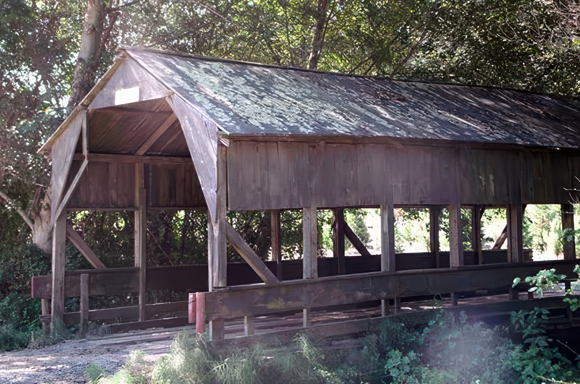 a rustic covered bridge