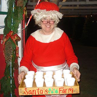 mrs. claus with hot cider